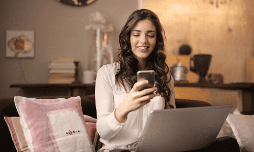 Girl using smart home mobile application to operate her home
