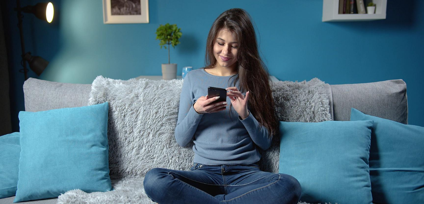 A girl using smart home application